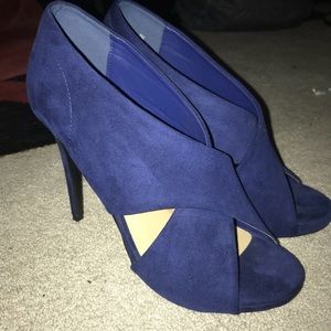 Blue heels worn once. Size 7